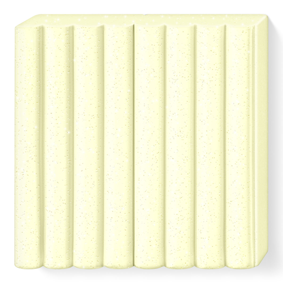 Unwrapped pearl yellow FIMO kids block, pale lemon with a fine shimmer, in 8 ribbed segments