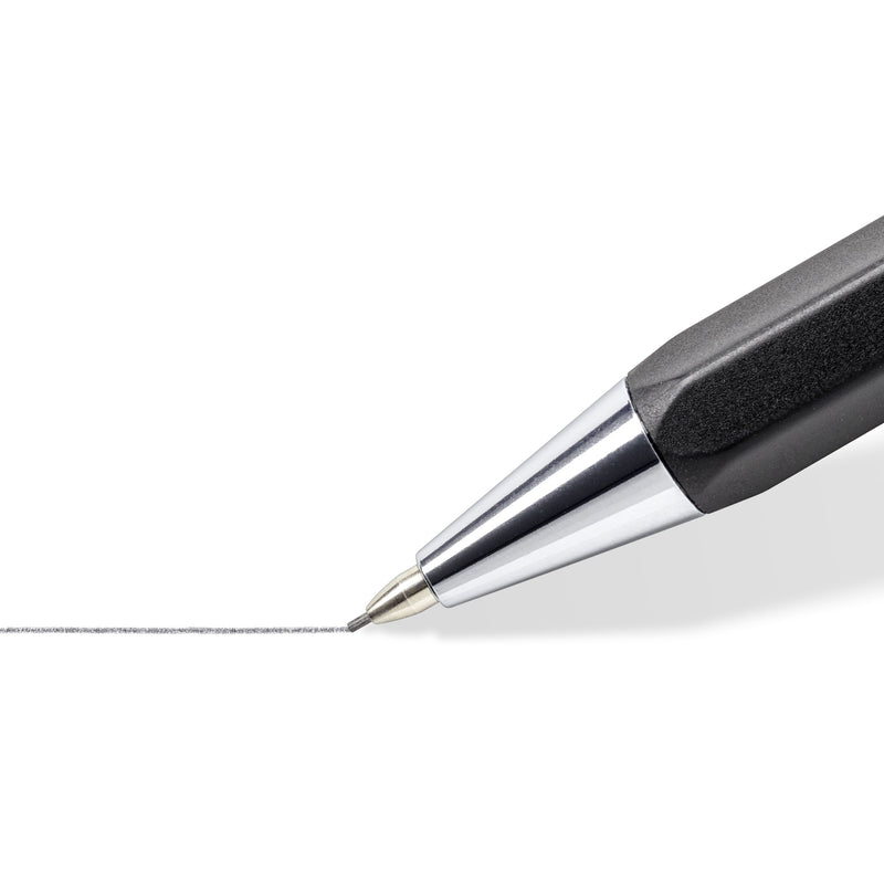 Close-up of the chrome tip cone of a black graphite 778 pencil drawing a fine line