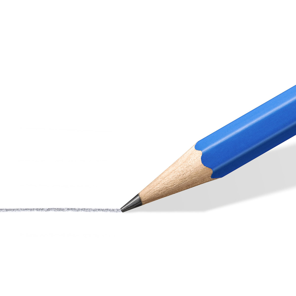 Close-up of a sharpened Mars Lumograph 2B point drawing a graphite line on white paper