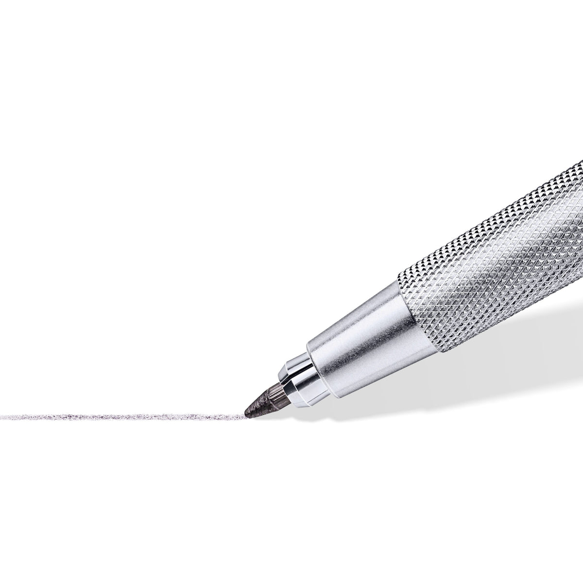 Close-up of the knurled metal grip and 2 mm lead of a Mars technico leadholder drawing a grey line