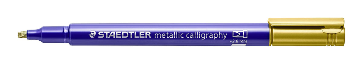 Gold Staedtler 8325 metallic calligraphy marker shown uncapped, one of the ten colours in this box, dark blue barrel and gold cap posted on the end