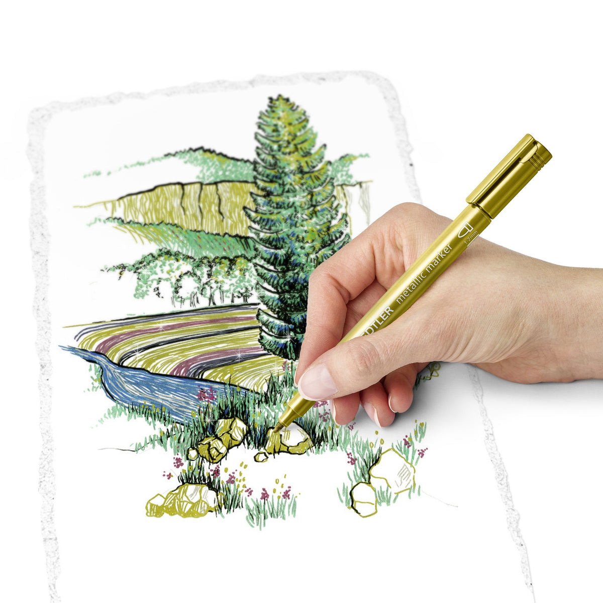 Hand drawing a landscape with trees and a river in gold metallic ink using a Staedtler metallic pen