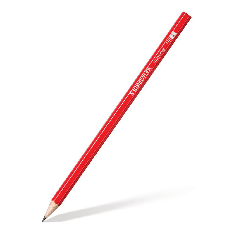 Red Staedtler Minerva HB pencil standing at an angle on its sharpened tip showing the hexagonal barrel and printed branding