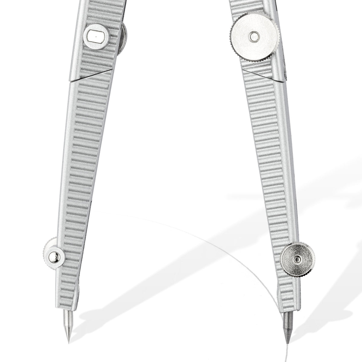 Close view of the hinged lead and needle legs of the Staedtler Noris 550 01 compass drawing an arc
