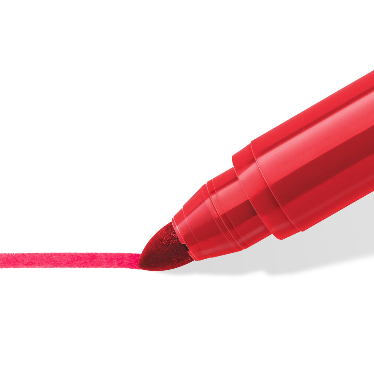 Close-up of a red Staedtler 340 jumbo marker tip laying down a broad red line
