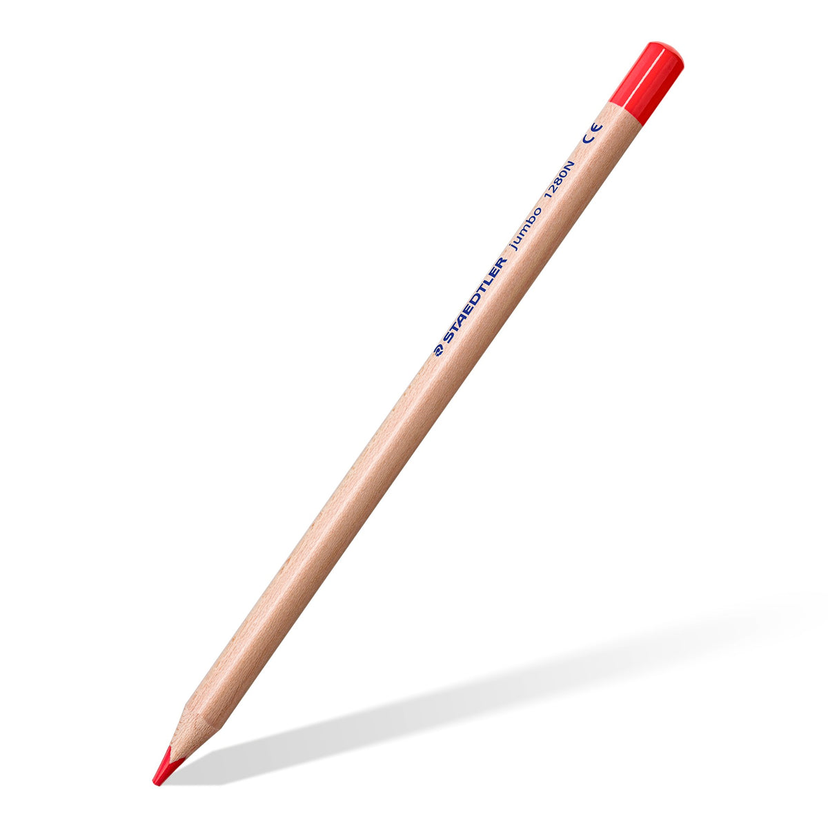One natural wood 1280N jumbo pencil with a red tip lying on the diagonal, a single example of the pencils in the cup