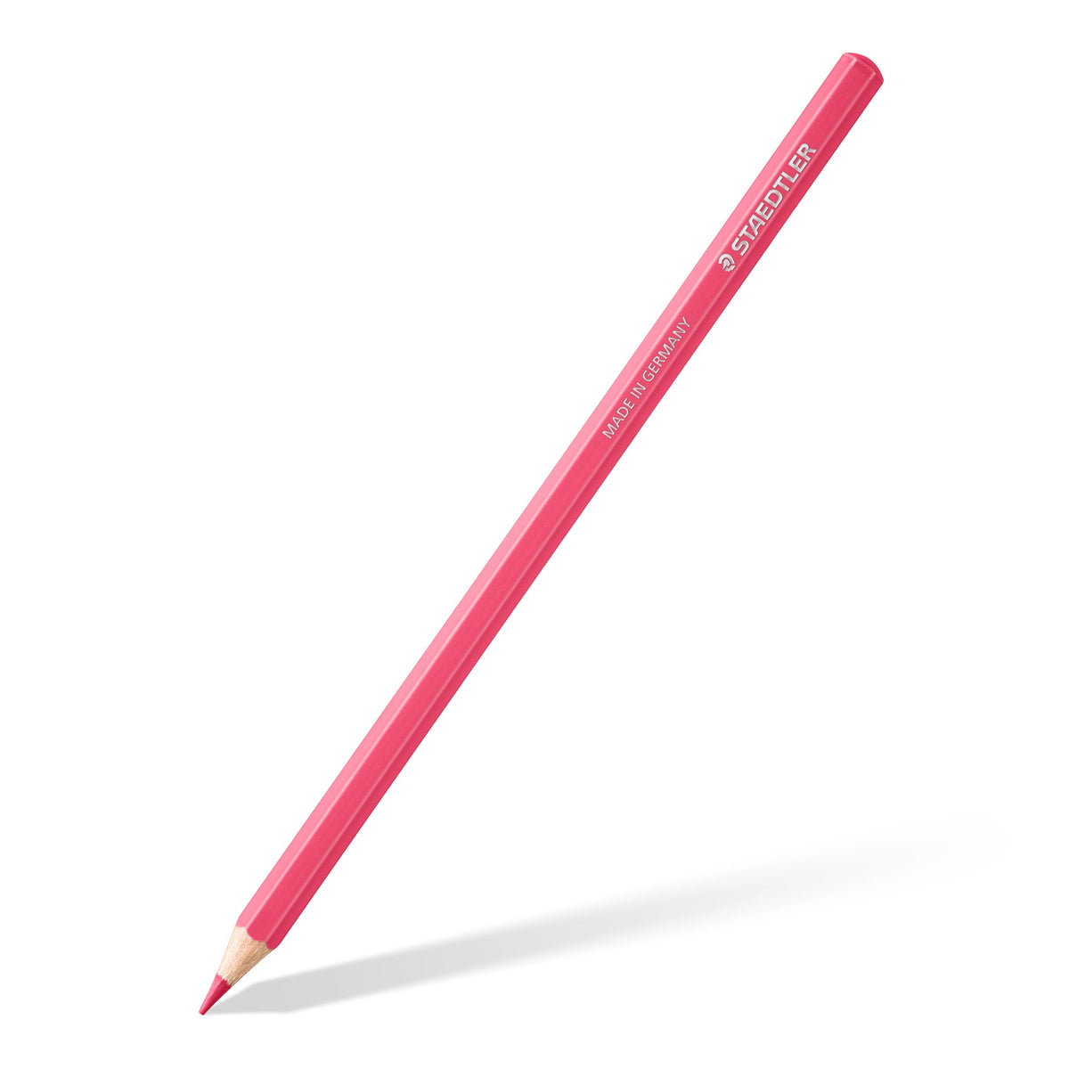 Single pink Staedtler 146 pastel coloured pencil with a hexagonal barrel, lying diagonally