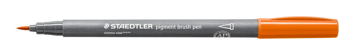 Staedtler 371-730 sienna raw pigment brush pen uncapped on white, grey barrel with Staedtler print and an orange earth coloured end