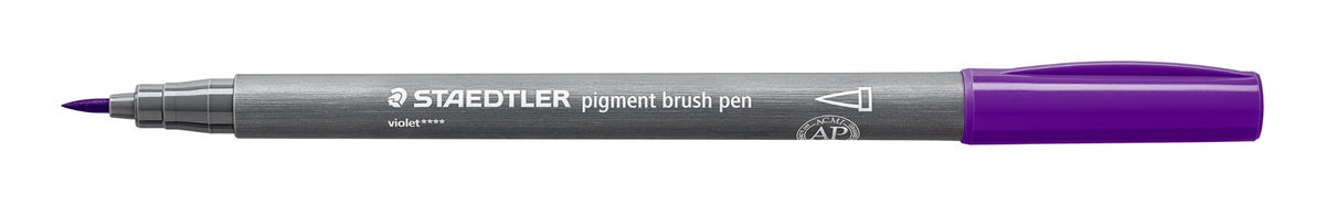 Single Staedtler 371-6 pigment brush pen laid flat, grey barrel printed with the Staedtler logo and violet, purple cap on the end