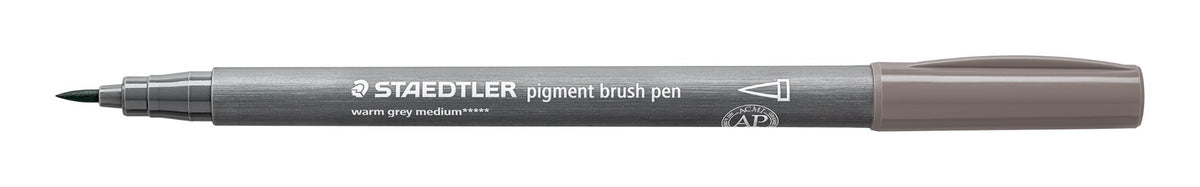 Staedtler 371-84 warm grey medium pigment brush pen, one pen on white with the barrel print visible and the grey cap posted