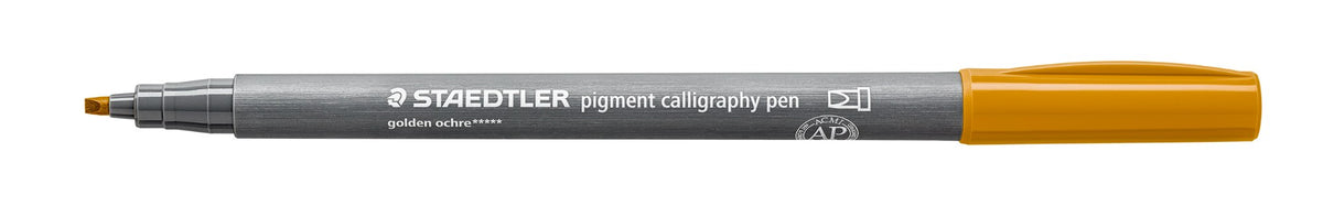 One Staedtler 375-16 calligraphy pen uncapped, golden ochre cap posted, barrel print reading golden ochre and chisel tip at left