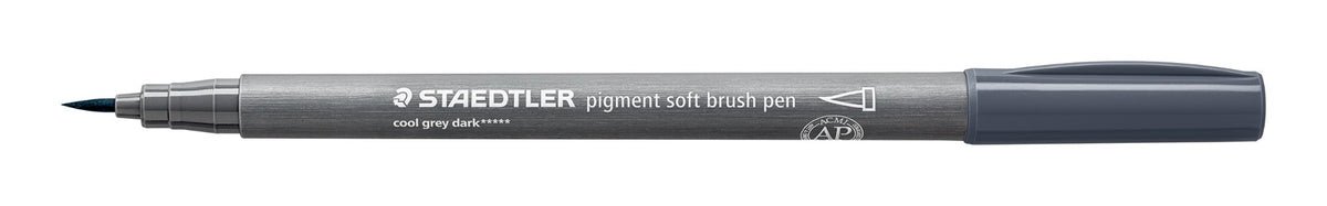 Uncapped Staedtler 372-871 soft brush pen side on, barrel printed cool grey dark, dark grey brush tip at left and cap posted on the end