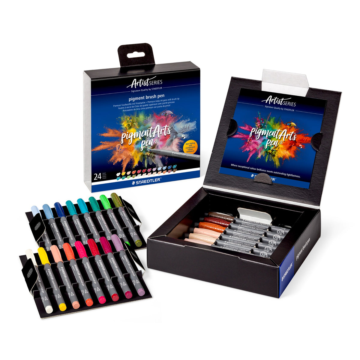 Staedtler Artist Series box of 24 opened, with card trays of pigment brush pens in pale, blue, green, red and brown shades beside the closed box
