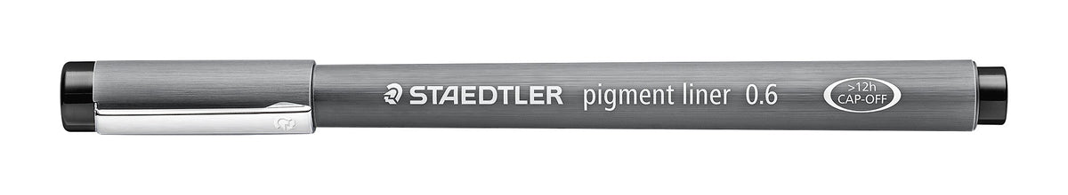Capped Staedtler pigment liner marked 0.6 on the grey barrel, with silver clip and black end