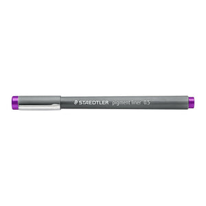 Capped violet Staedtler pigment liner 0.5 lying flat, with silver clip and violet end band visible