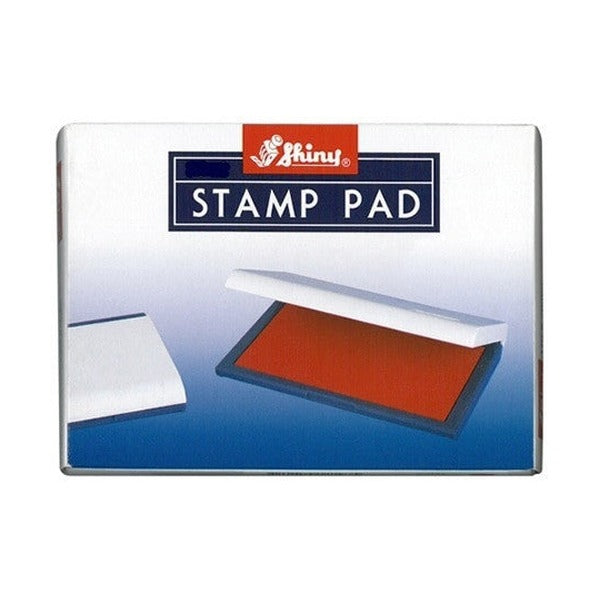 Shiny felt stamp pad packaging, STAMP PAD in white on a navy panel under the Shiny logo, with an illustrated pad below