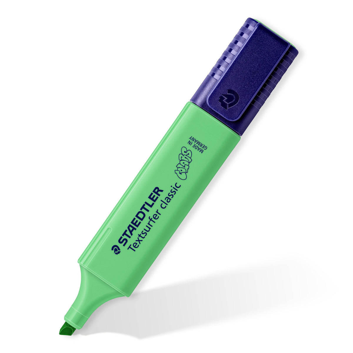 Single pale green Textsurfer classic standing at an angle on its chisel tip, Staedtler and COLORS print on the barrel