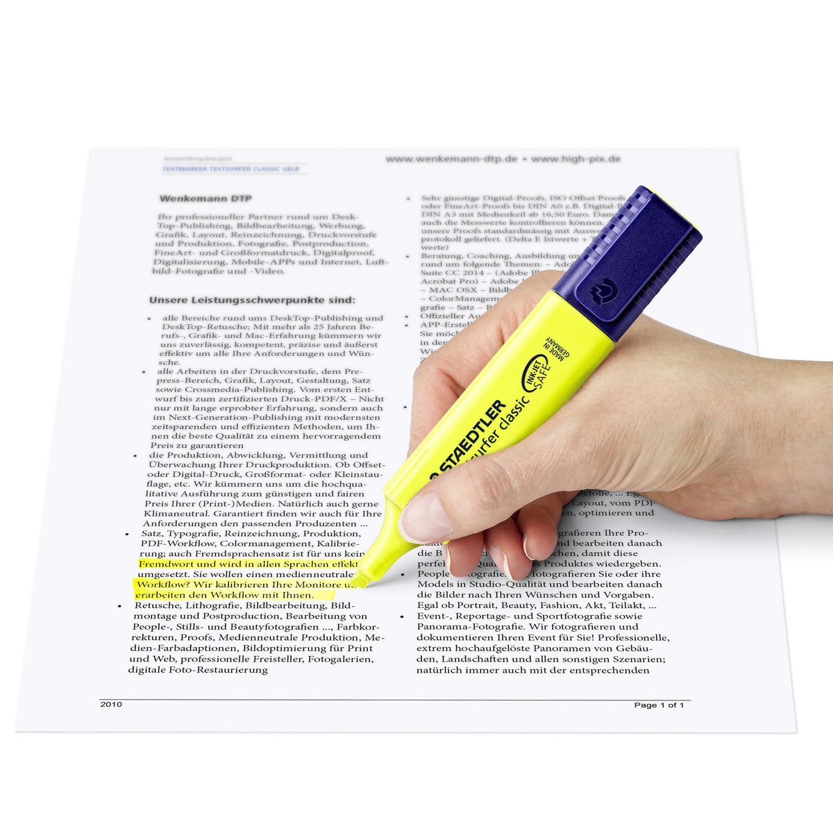 Hand highlighting a printed page with a yellow Textsurfer classic, from Staedtler's 364 range photos