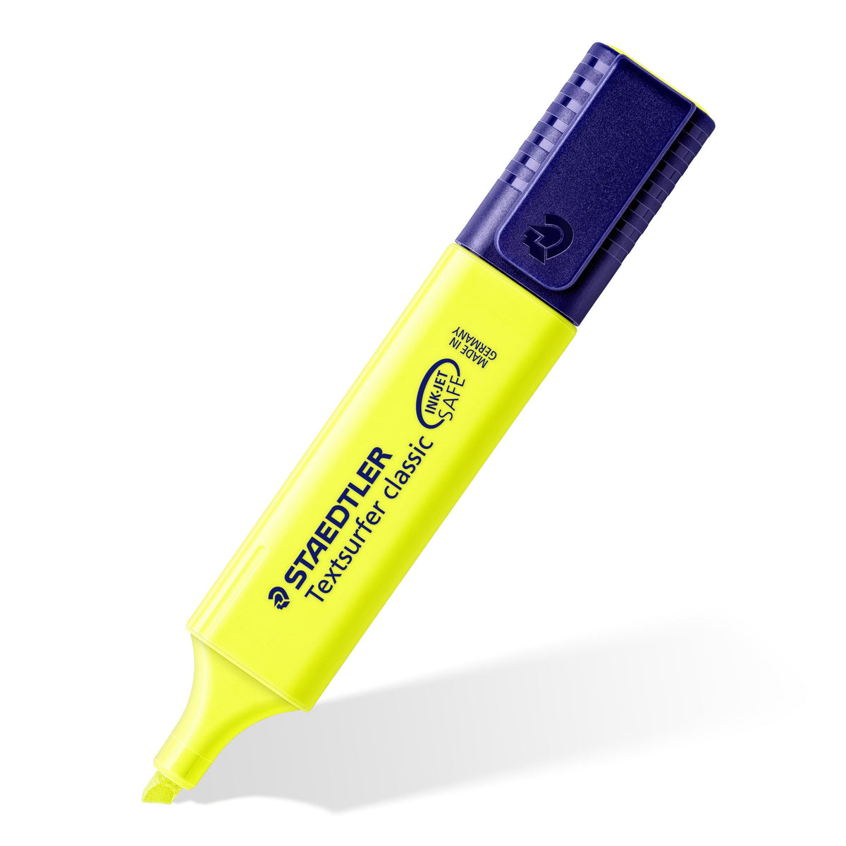 Single yellow Textsurfer classic standing at an angle on its chisel tip, Staedtler print on the barrel