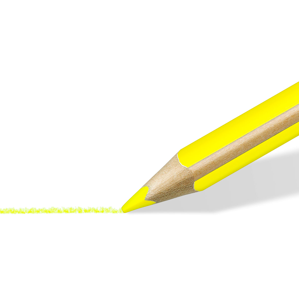 Close-up of the sharpened yellow wax lead of a Staedtler Textsurfer dry highlighter pencil drawing a highlight