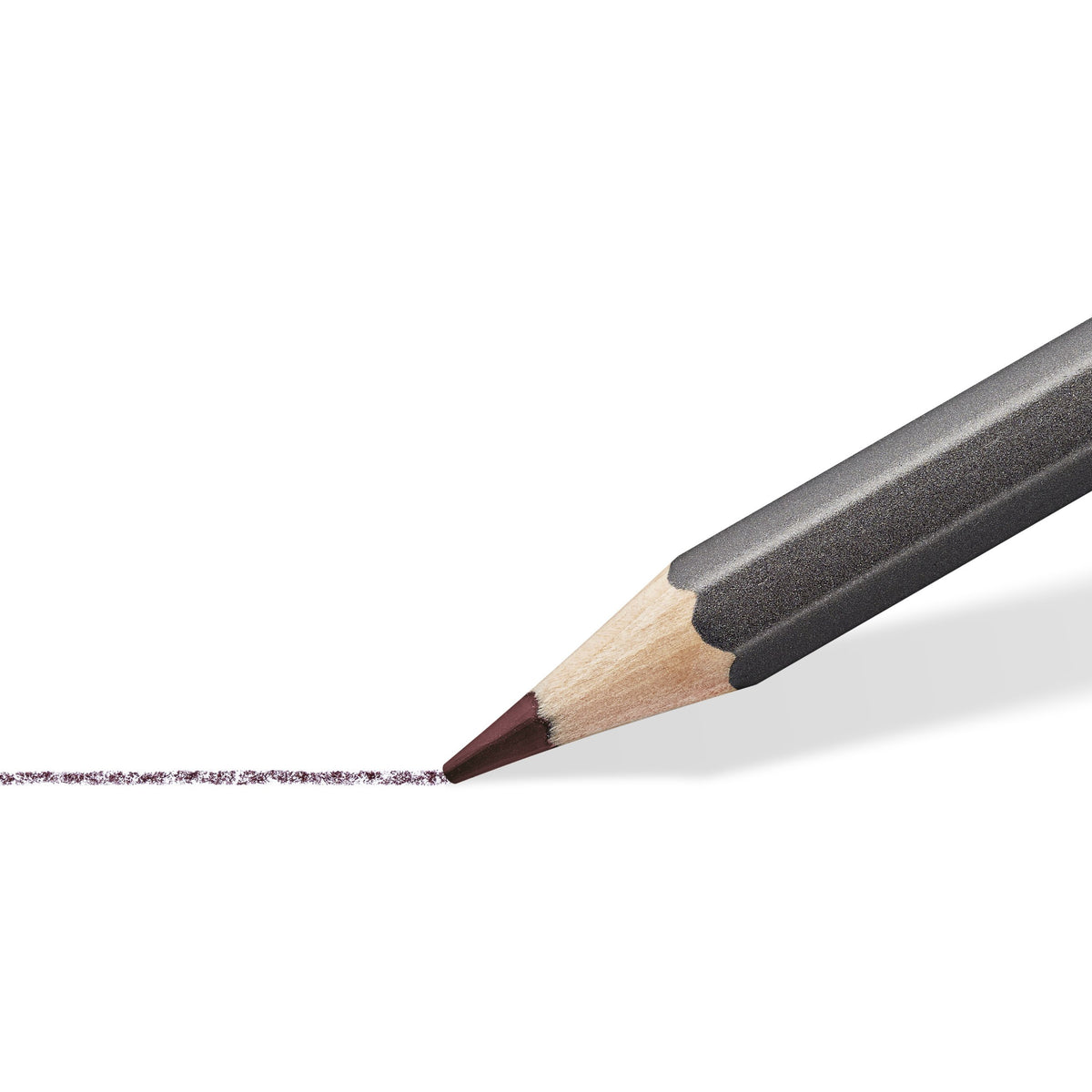 Close-up of a tinted watercolour pencil point drawing a muted line on paper