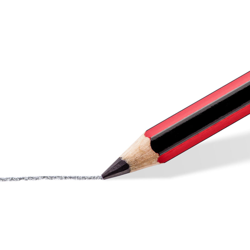 Close-up of a sharpened Staedtler tradition point drawing a dark soft graphite line on white paper