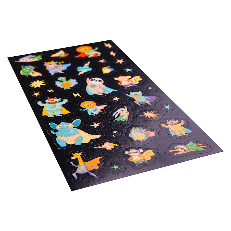 Angled close up view of the sticker sheet highlighting individual glow in the dark superhero animal designs. Bright colours and playful character illustrations make the stickers ideal for children's creative projects.