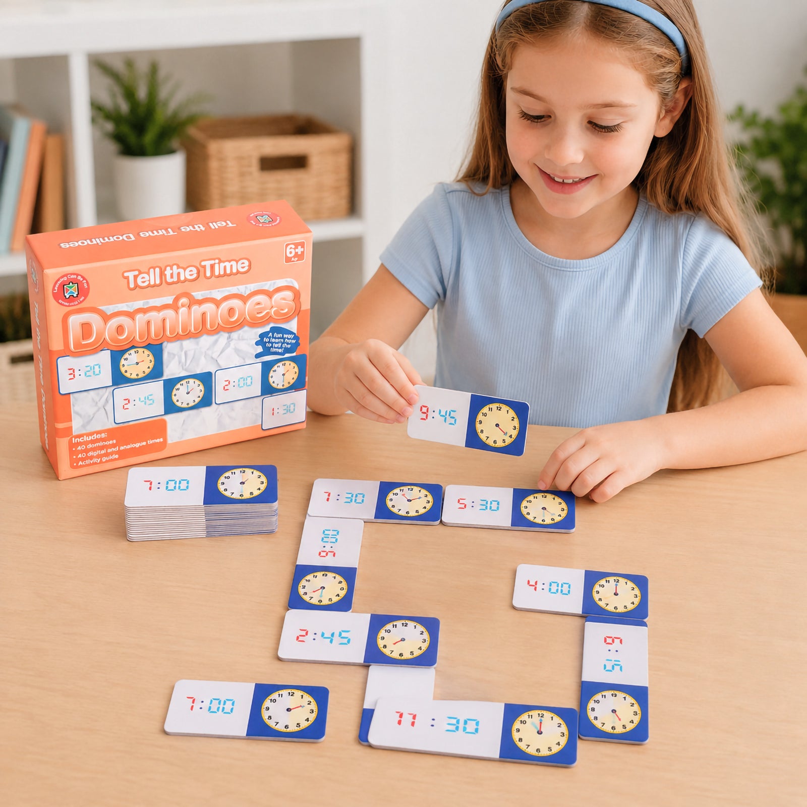 Young learner using Learning Can Be Fun Tell the Time Dominoes to match analogue clock faces with corresponding digital times. The educational game promotes time telling skills, numeracy development and hands on learning through engaging dominoes gameplay.