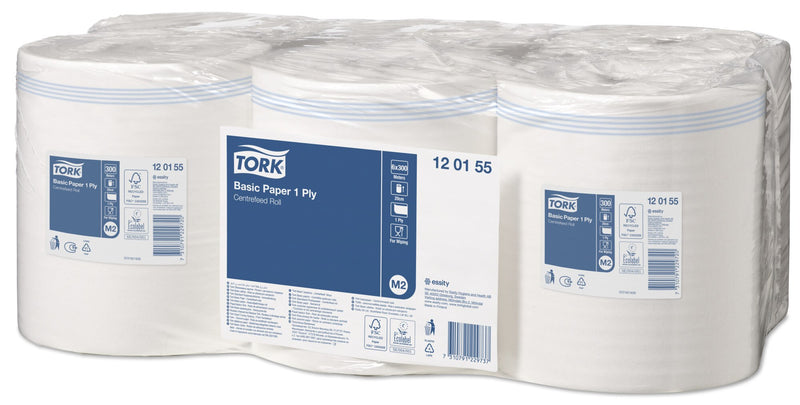Angled side view of the shrink wrapped six roll Tork 120155 carton, white rolls with pale blue banding, showing printed labels with 300 metres per roll, 20cm width, 1 ply, For Wiping and M2 icons, FSC Recycled and EU Ecolabel marks and the barcode panel