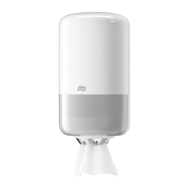White Tork Mini Centrefeed Dispenser 558000 shown at a slight angle with a sheet of white paper pulled through the toothed outlet at the base of the M1 Elevation housing