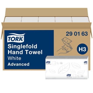 Open kraft carton of Tork Soft Singlefold Hand Towels, white sleeves stacked inside, navy front panel reading Singlefold Hand Towel White Advanced with code 29 01 63 and blue H3 badge, one leaf embossed sleeve in front.