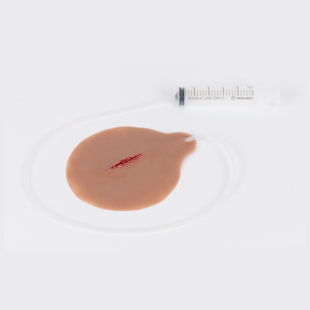 TraumaSim Self-Adhesive Stab Wound with Bleeding Capacity realistic penetrating wound moulage for trauma and haemorrhage control training