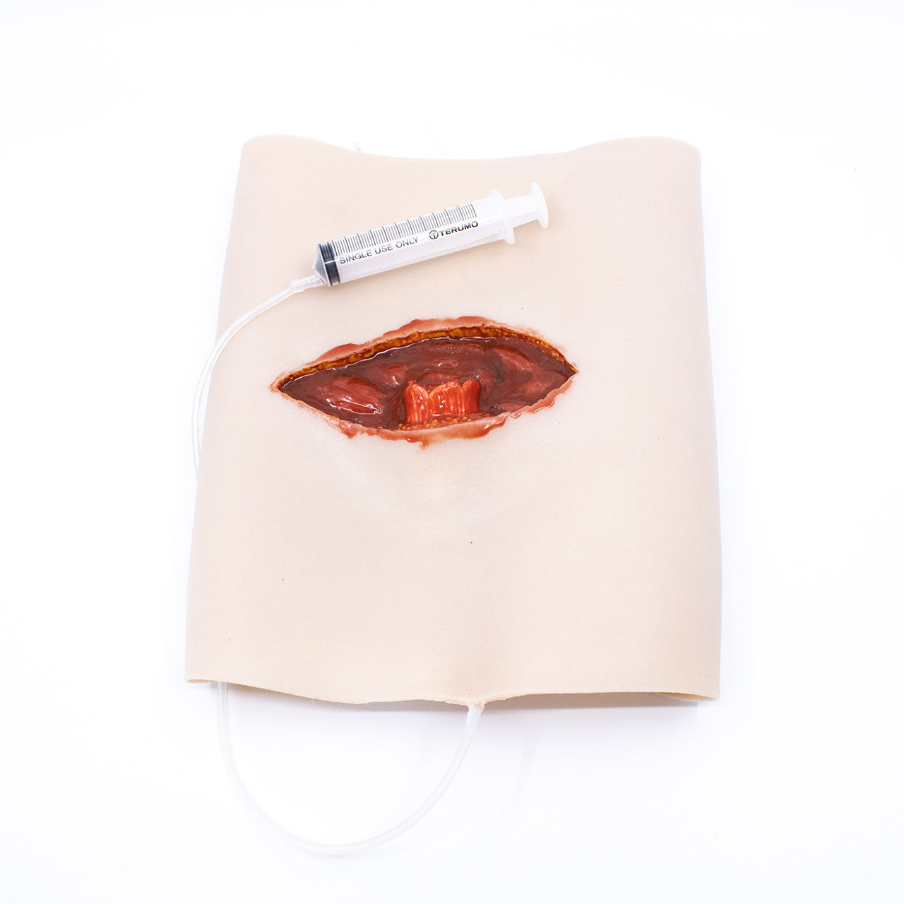 TraumaSim Wearable Open Femur Fracture Upper Leg with Bleeding wearable moulage for combined fracture and haemorrhage training