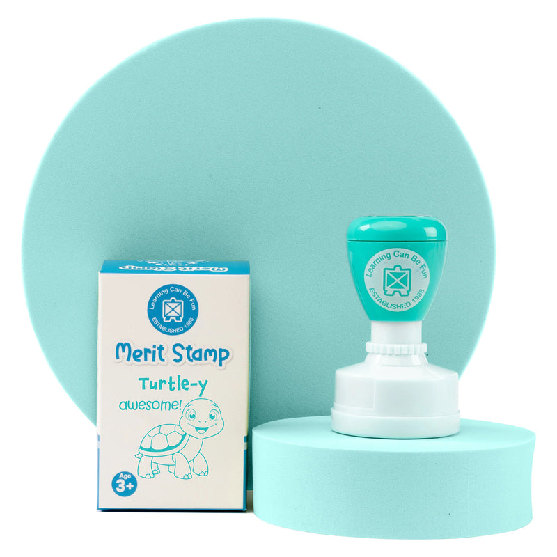 Retail packaging and Turtle-y Awesome Merit Stamp presented on a display stand. The image highlights the Learning Can Be Fun branding, product packaging and playful turtle themed reward design for educational settings.