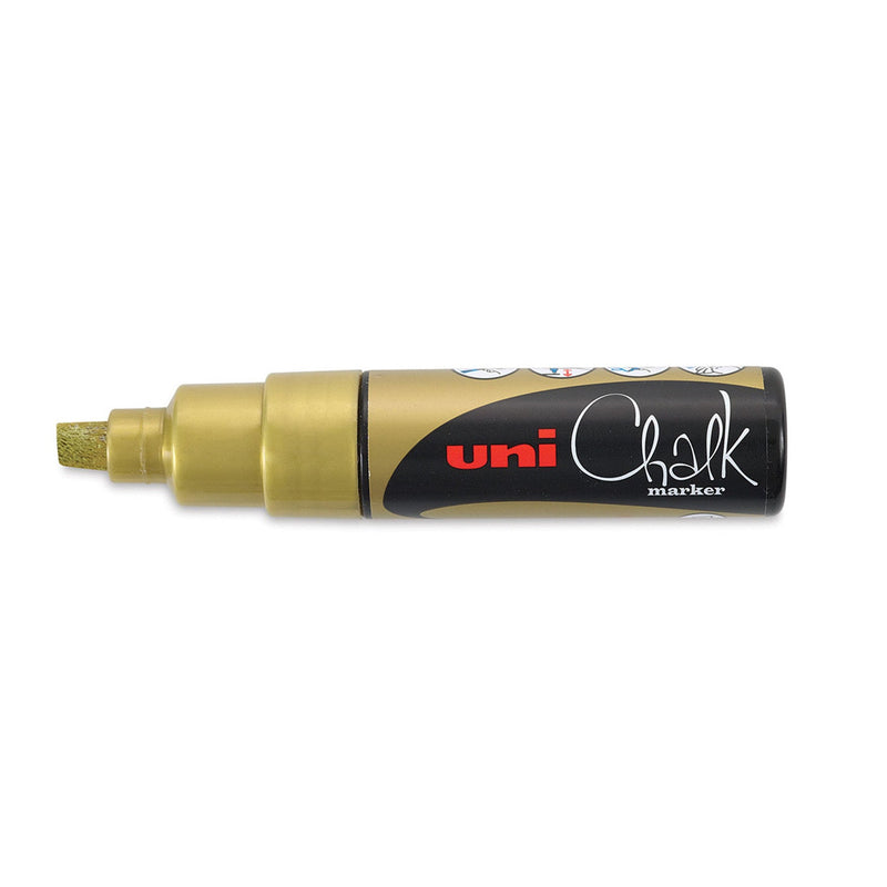 Uni PWE-8K liquid chalk marker in gold, capped, with the gold chisel tip facing left, a gold collar and the black uni Chalk marker label
