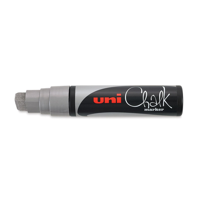 Uni PWE-17K liquid chalk marker in metallic silver with the cap off, showing the wide silver chisel tip and silver band on a black body