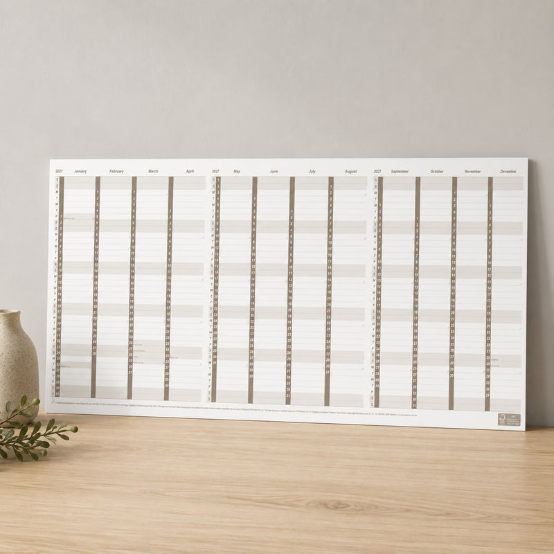 The Upward 2027 A4 Fold Out Paper Planner is displayed unfolded against a neutral wall, showcasing the complete annual calendar layout. Its slim paper design makes it suitable for pinning to office walls, study spaces or home planning areas for quick reference throughout the year.