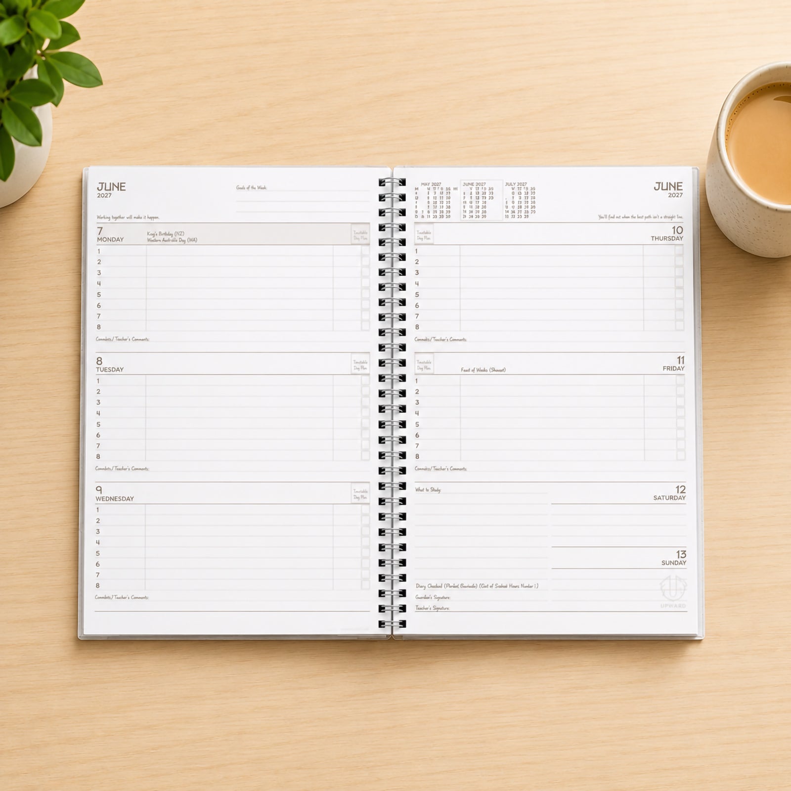 Interior weekly planning pages displayed open on a desk. The week to view layout provides dedicated spaces for each day, making it easy for students to record homework, assignments, study sessions and important school activities throughout the week.