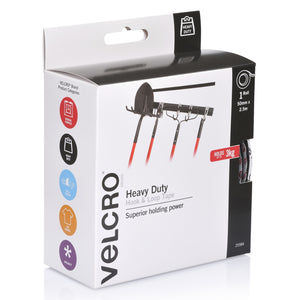 Angled view of the Velcro Brand Heavy Duty Hook and Loop Tape box, code 25584, with garden tools on a wall rail, a badge reading Holds up to 3kg and Velcro product category icons on the side panel