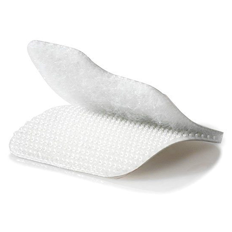 Close up image of white VELCRO Brand removable mounting squares showing the hook and loop fastening surfaces separated for easy peel and stick application.