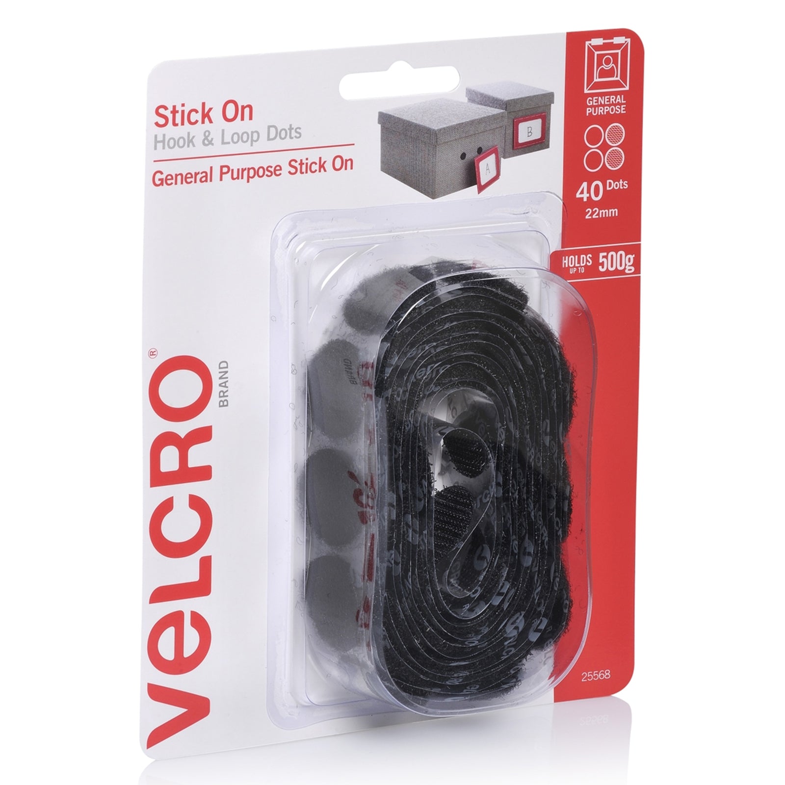 Angled retail packaging image showing the VELCRO Brand Stick On Hook and Loop Dots pack with visible black fastening dots inside clear packaging for practical storage and organisation solutions.