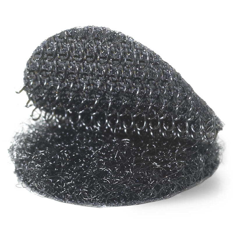 Macro photograph displaying the black hook and loop fastening material with visible hook texture and soft loop surface designed for durable reusable fastening applications.