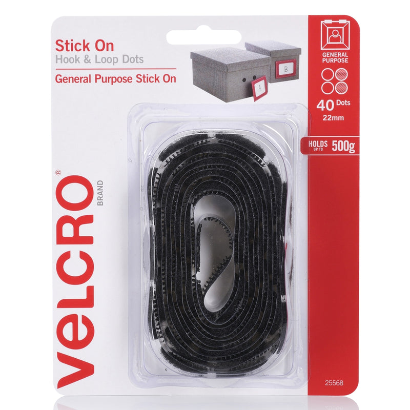 Front packaging photograph of the VELCRO Brand Stick On Hook and Loop Dots 22mm black pack of 40 displaying product branding, quantity details, and holding strength information.