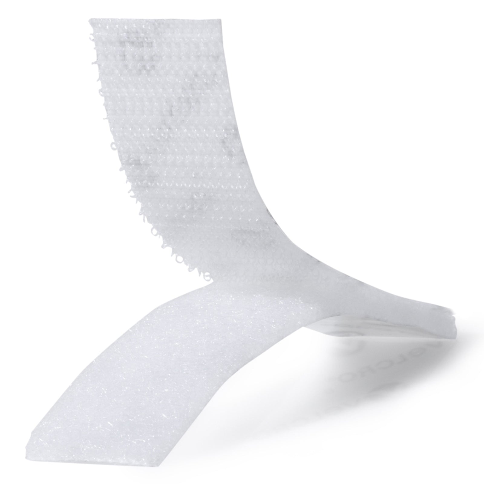 Curved white VELCRO Brand hook and loop tape strips displayed against a clean white background highlighting flexible reusable fastening material.