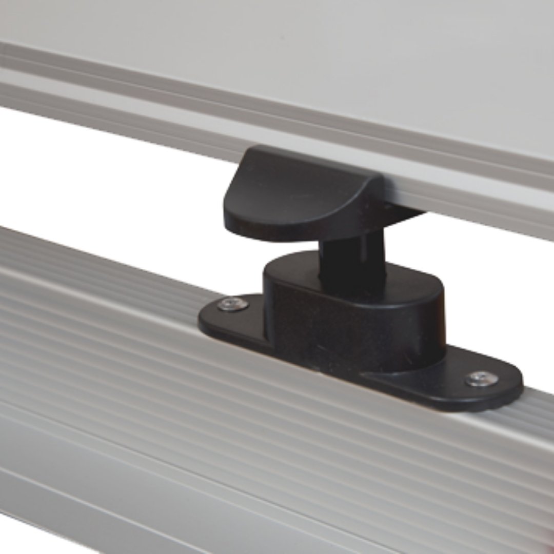 Close up of the black pivot lock knob mounted on the silver aluminium side rail of the Chilli frame, the fitting that holds the board in position after it is rotated.