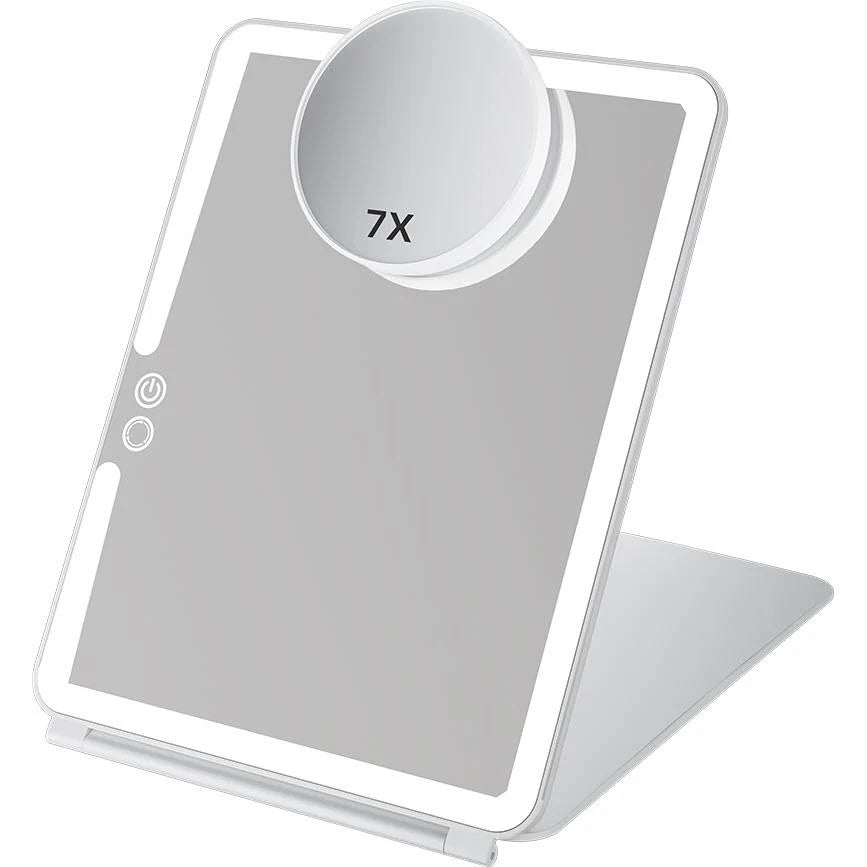 Wellcare foldable LED makeup mirror shown at an angle with the round 7X magnifier attached to the glass, on a white background