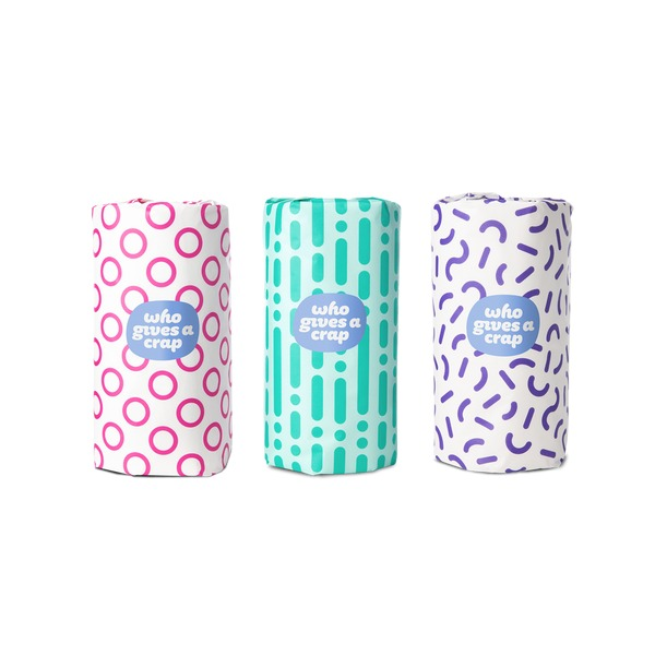 Who Gives A Crap Forest Friendly Kitchen Paper Towel 2-ply group shot showing all 6 rolls from the pack fanned on neutral background