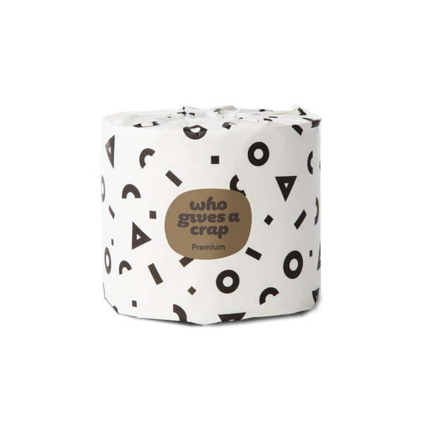Who Gives A Crap Premium Bamboo Toilet Paper 3-ply single roll close-up detail on neutral background highlighting soft texture and bamboo material label