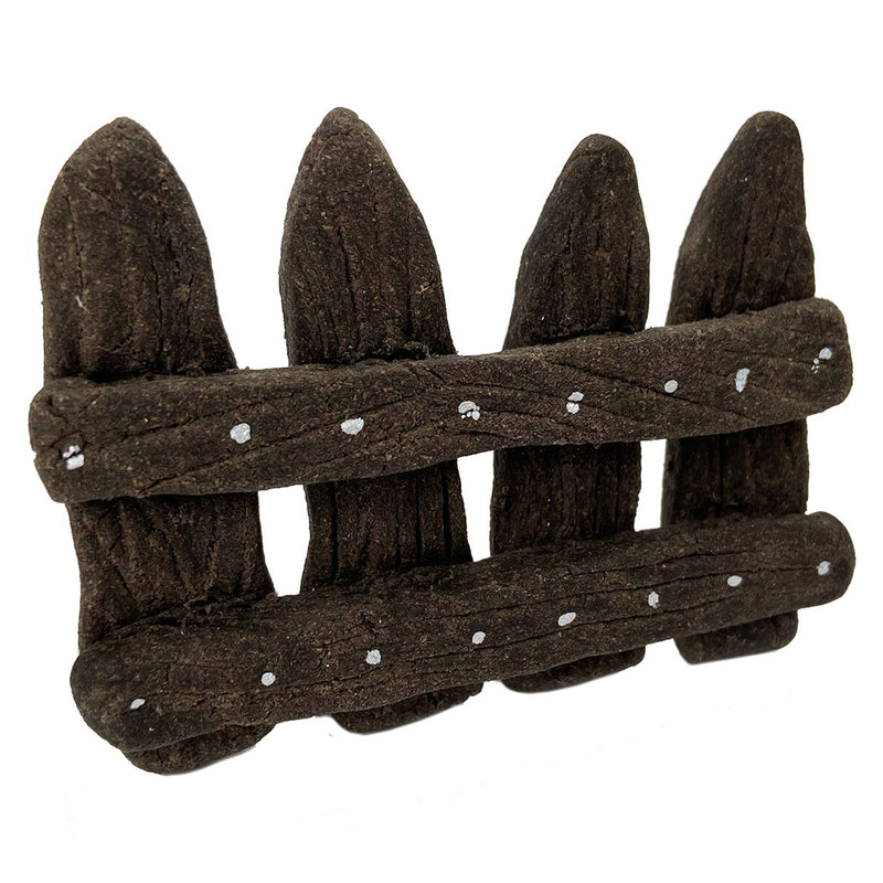 Close up of a handcrafted miniature fence made using Dark Brown Wooden Clay. The detailed wood grain texture and rustic appearance highlight the clay's realistic wooden finish after shaping and drying.