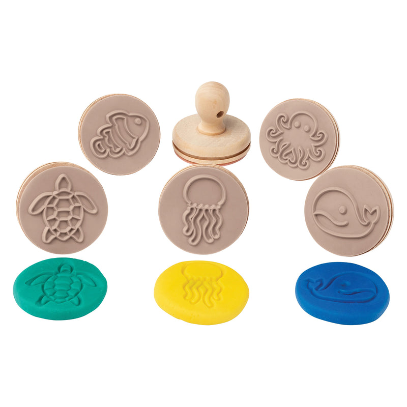 Product display featuring wooden sea creature dough stamps with fish, turtle, jellyfish, whale and octopus designs alongside colourful dough impressions. The image showcases detailed stamp patterns and child friendly wooden handles for sensory activities.